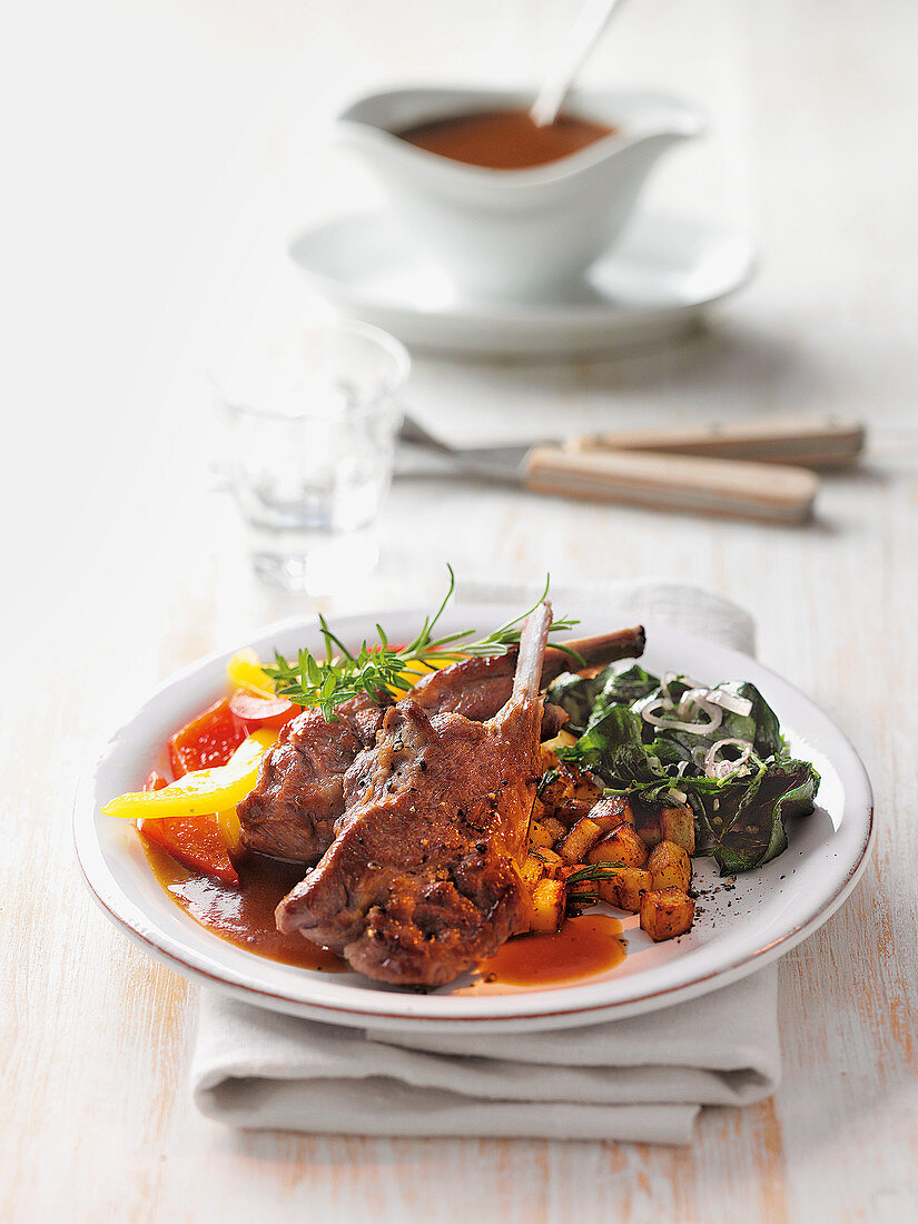Lamb chops with ground-elder and a pepper medley