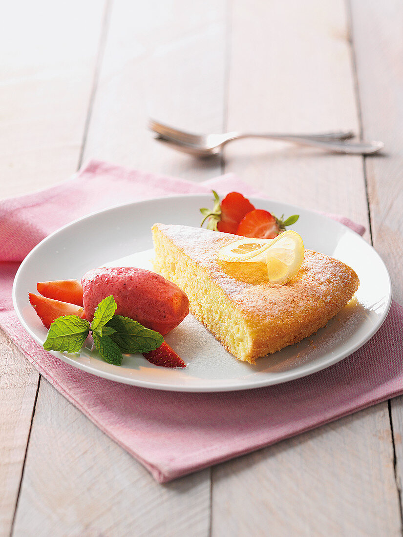 Fresh strawberry ice cream with warm lemon cake