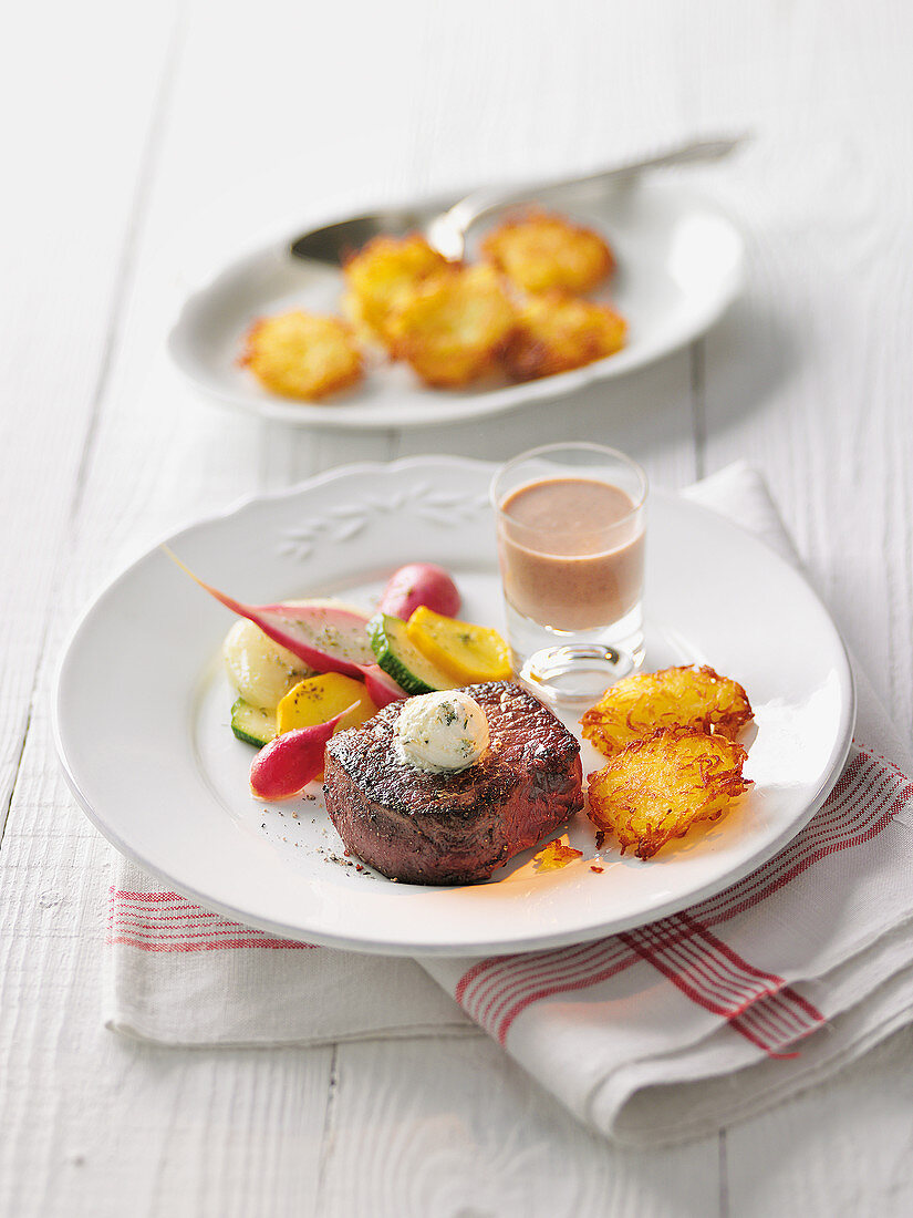 Beef fillet with glazed vegetables with potato fritters