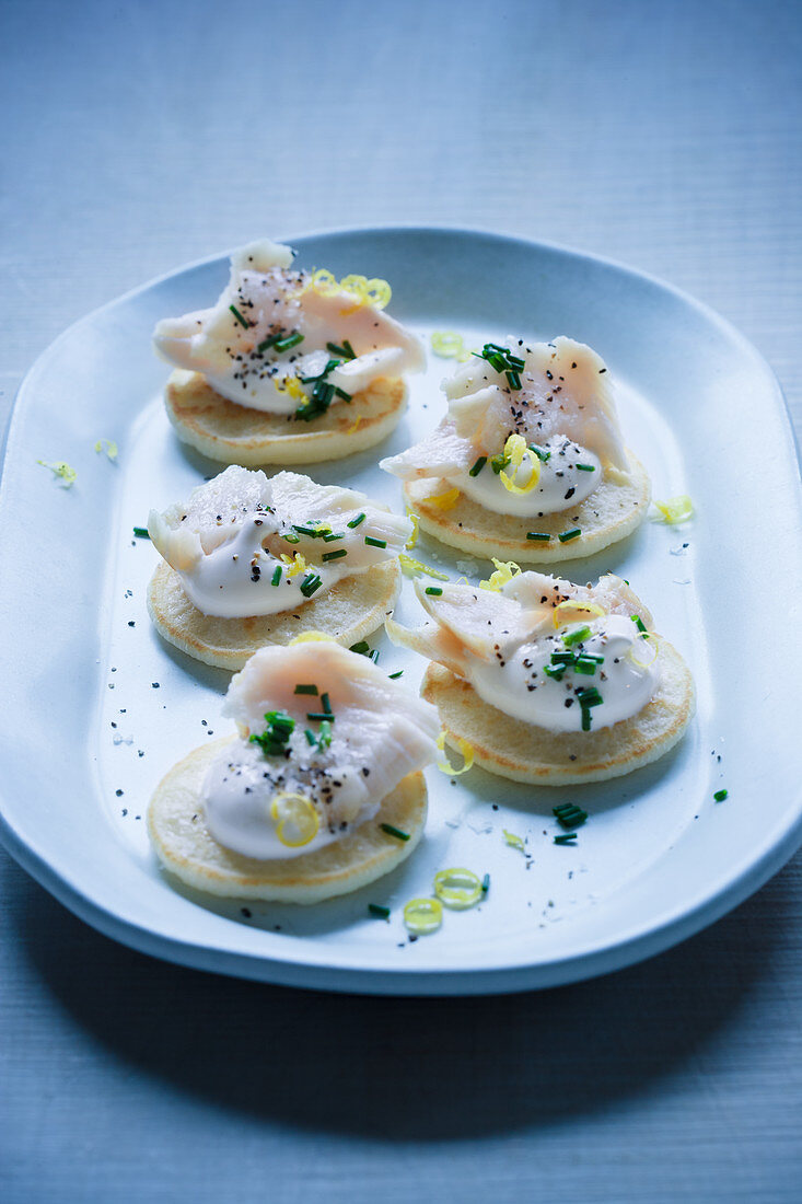Blinis with smoked fish and sour cream