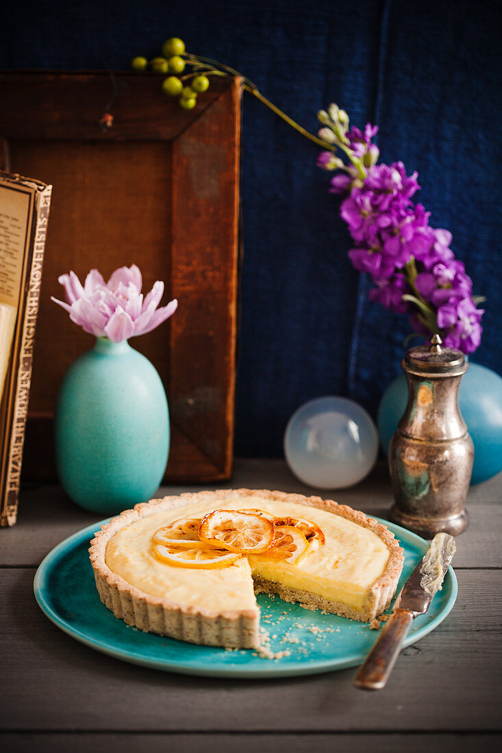 Almond tart with lemon cream, sliced