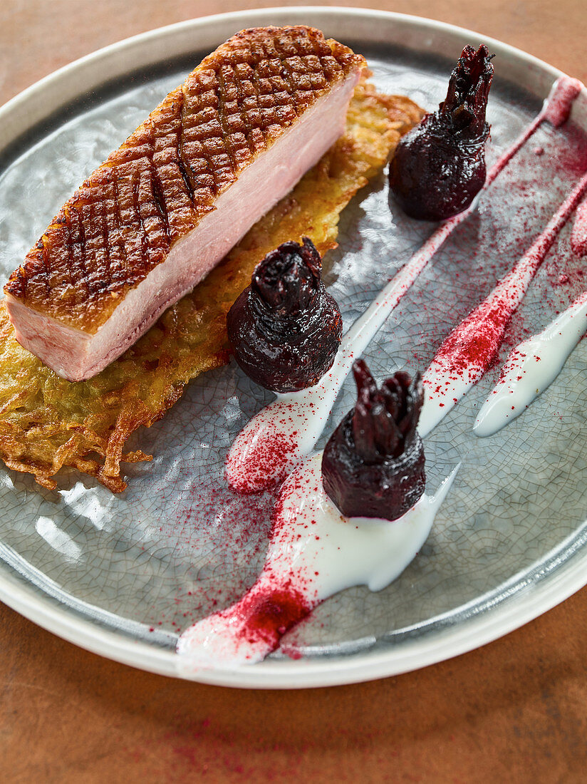 Duck breast with a potato rösti, beetroot and horseradish yoghurt