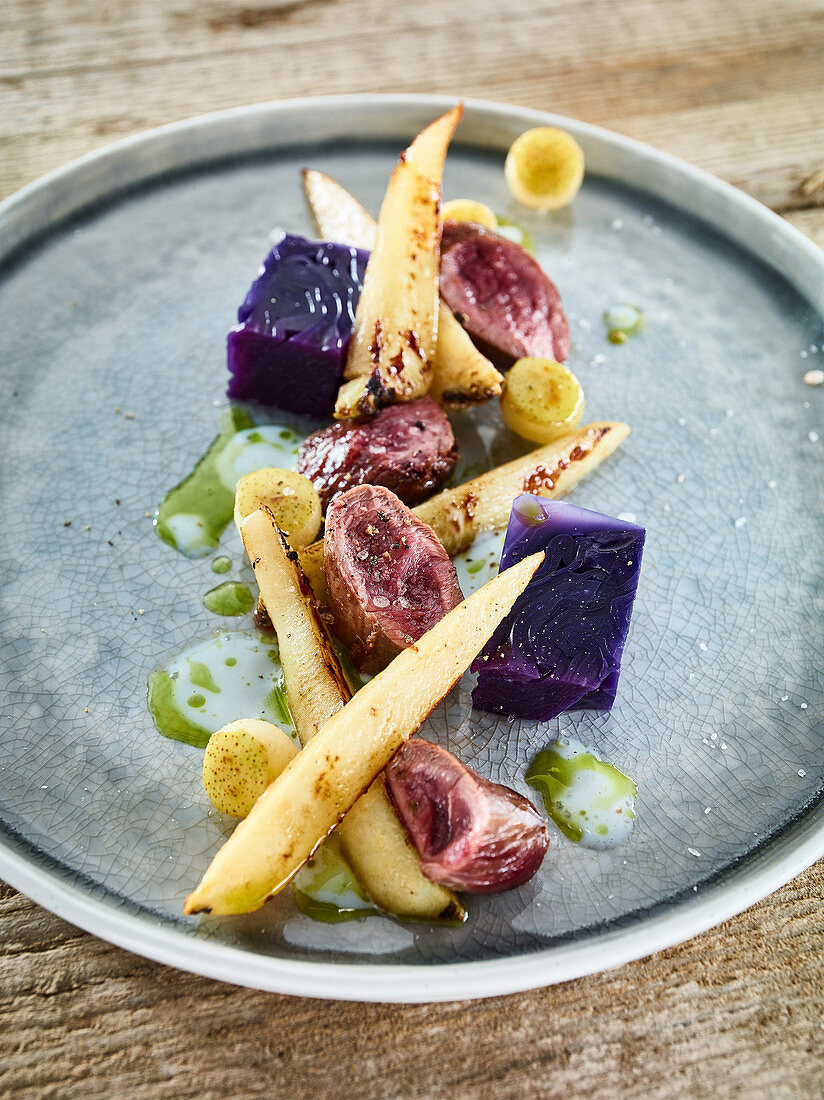 Wild rabbit fillets with Sousvide red cabbage, parsnip, pear and chervil