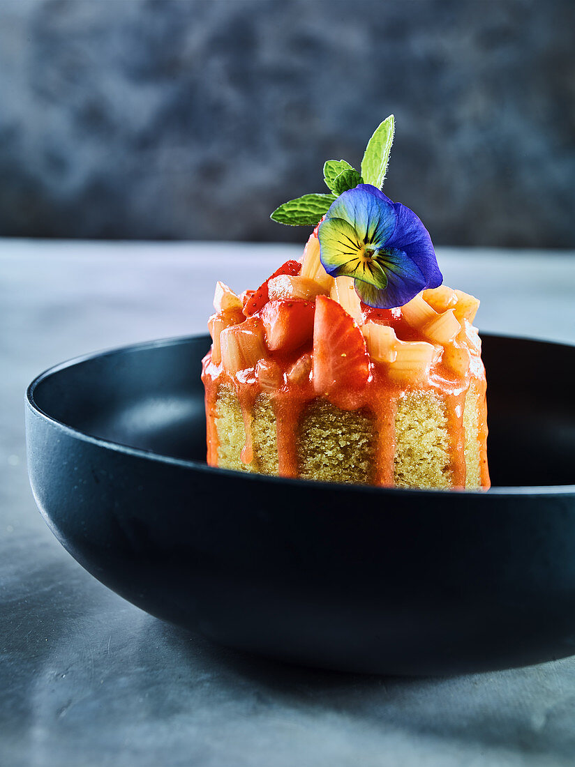 Hazelnut cake with strawberry rhubarb compote and woodruff syrup