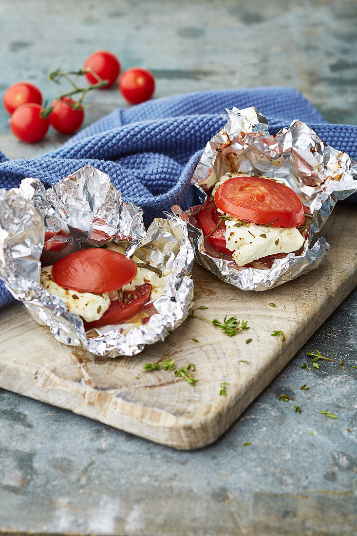 Mediterranean sheep's cheese with tomatoes baked in foil