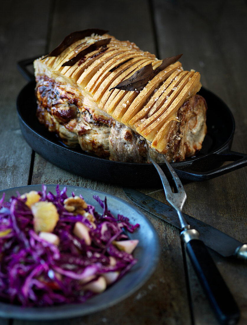Roast pork with a red cabbage salad