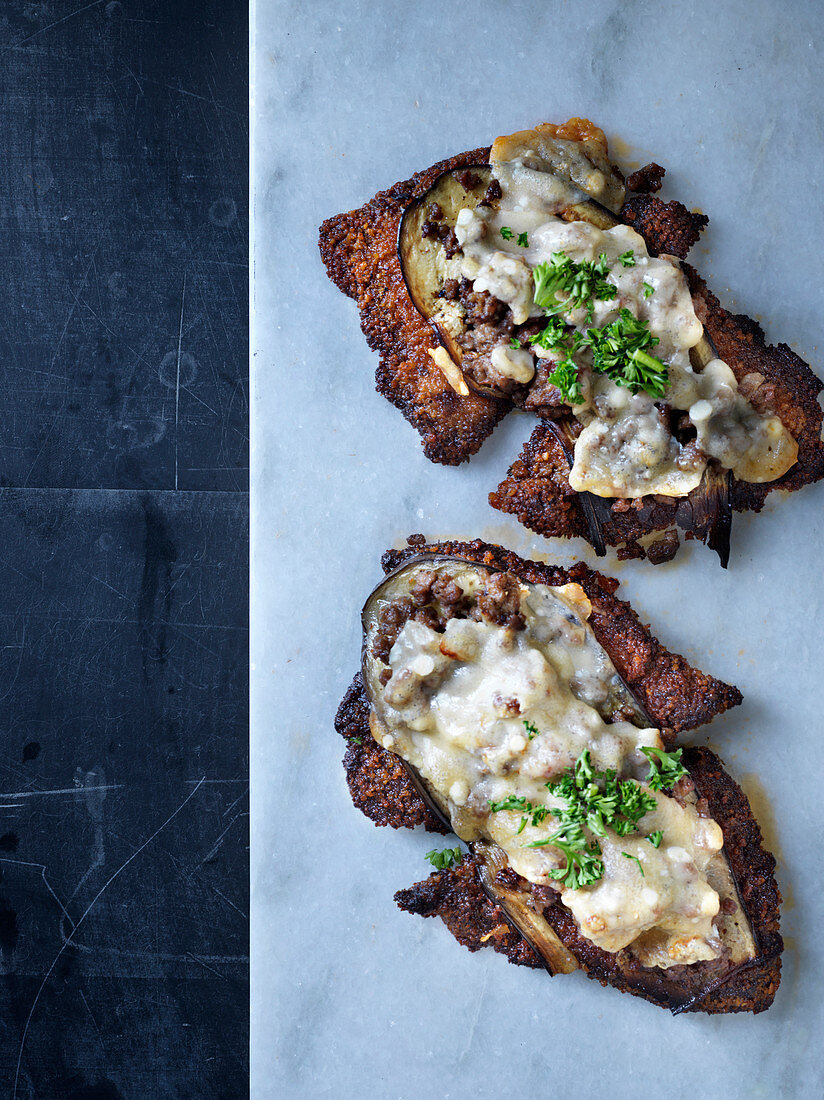 Scaloppine Milanese with aubergines and Parmesan cheese