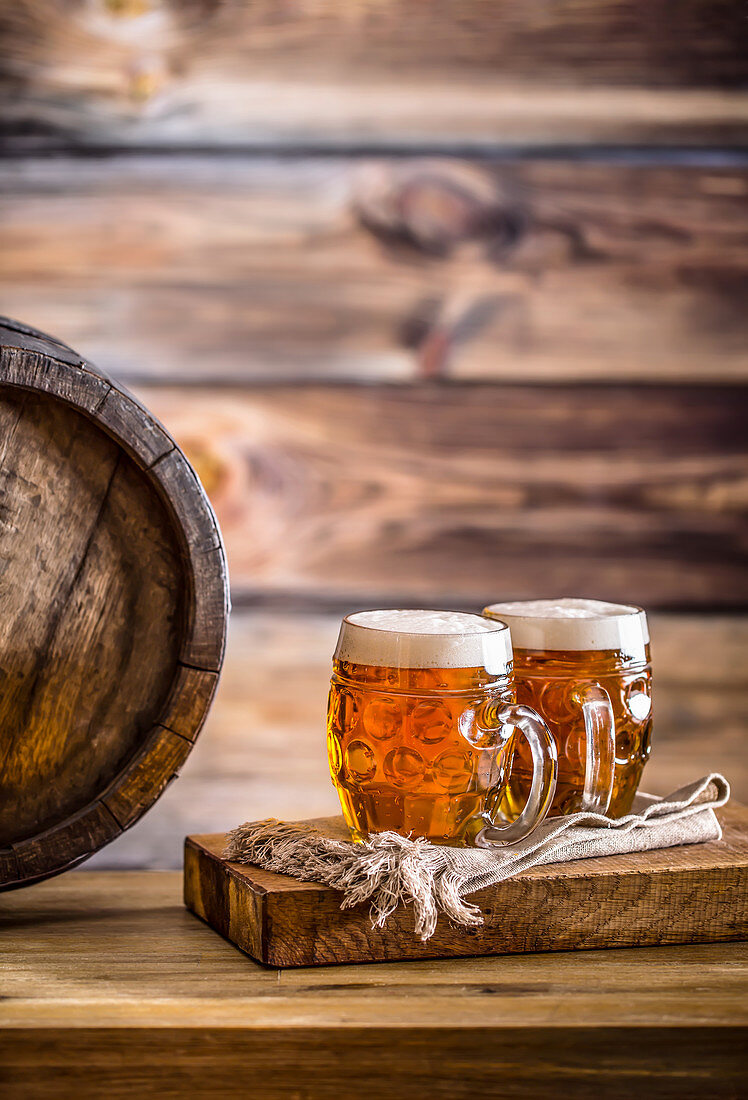 Draft cold beer in glass jars