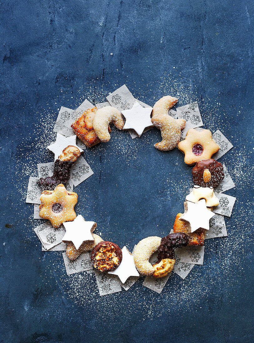 A Christmas wreath made from various biscuits