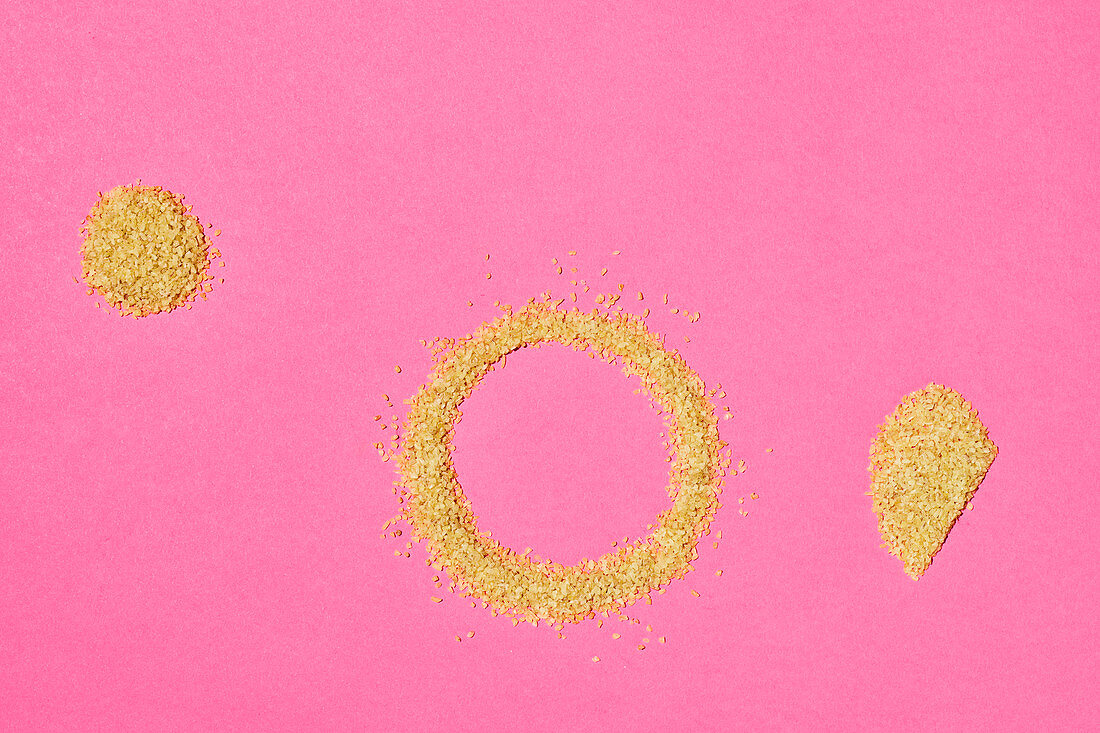 Mood bulgur on a pink surface