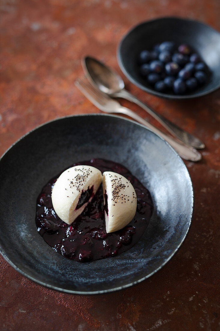 Germknödel (yeast dumpling) with blueberries and chia seeds