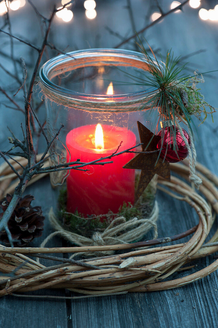 Mason jar as a lantern with red candle