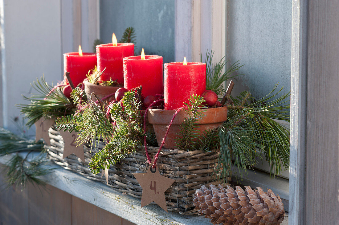 Basket as Advent wreath at the window