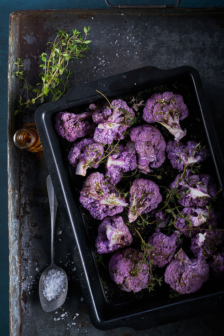 Roasted purple cauliflower with thyme in oventray