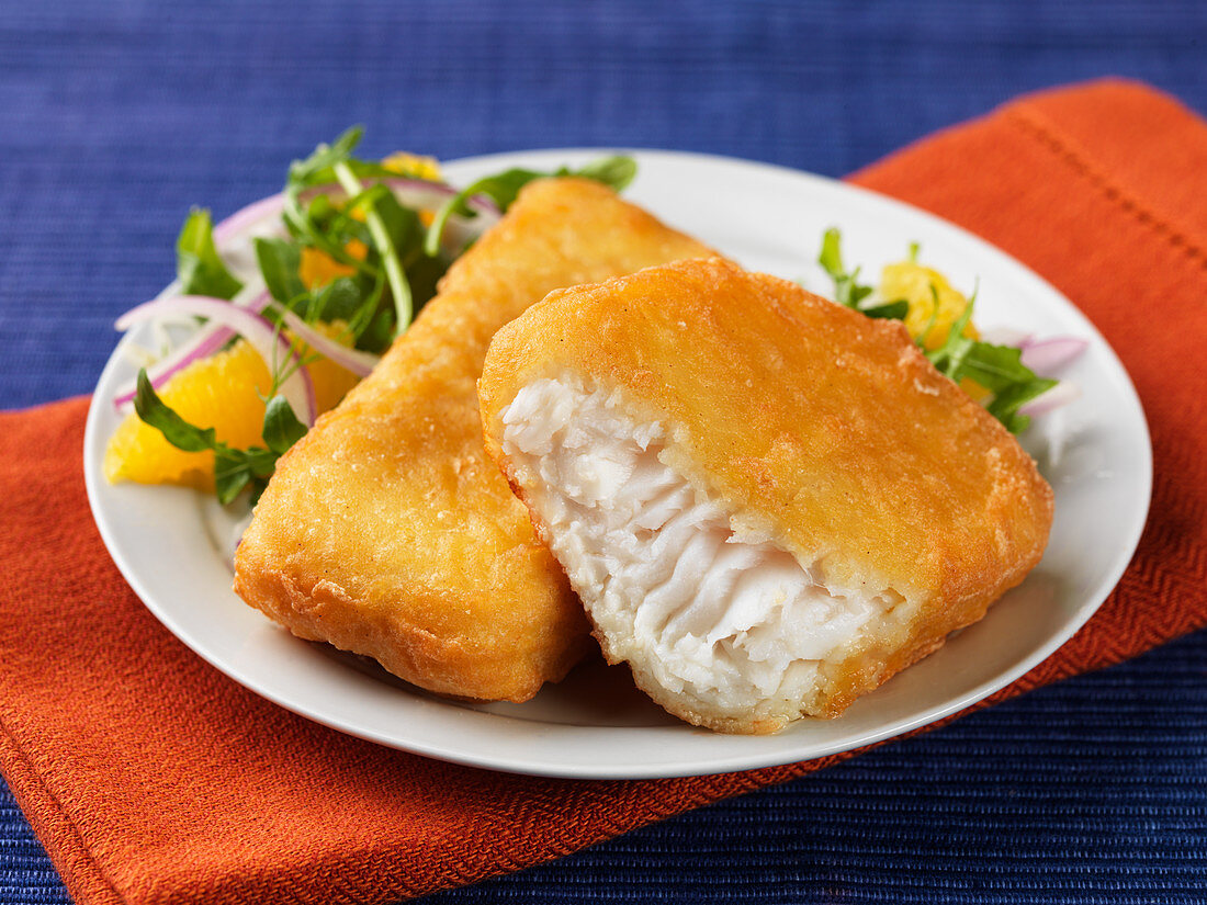 Halibut in batter with a salad side dish