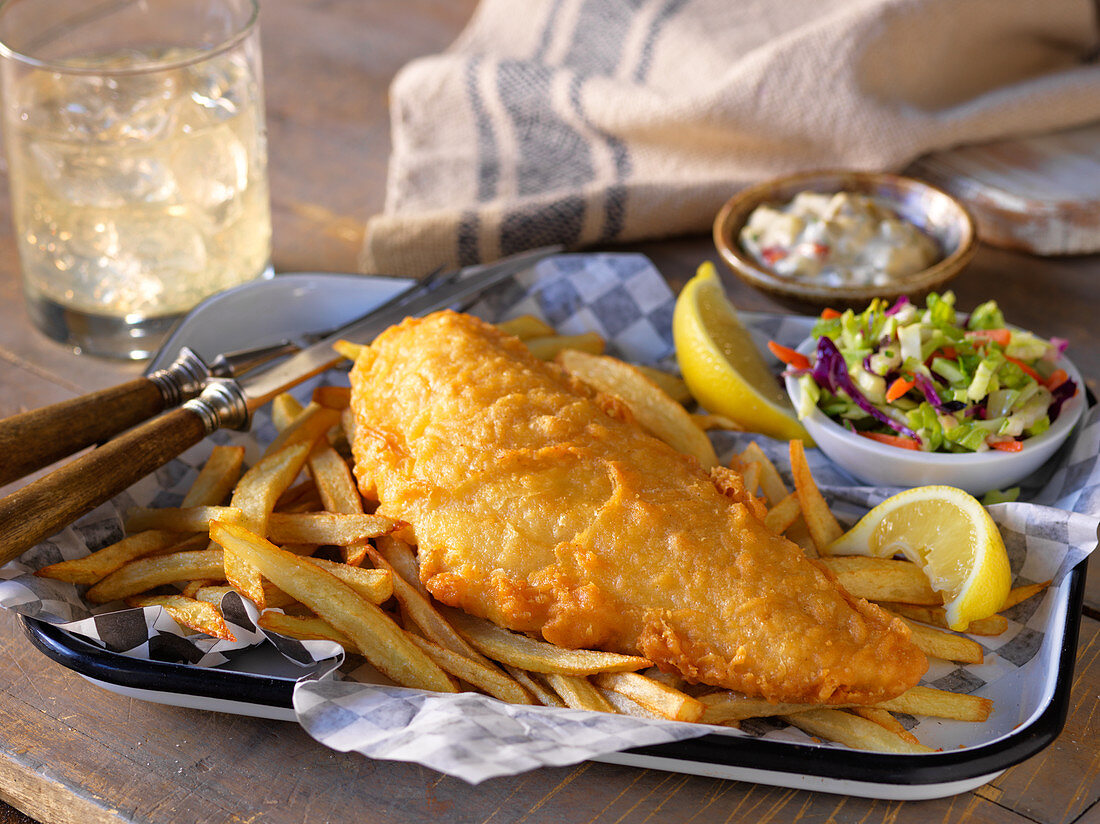 Cod in batter with French fries and salad