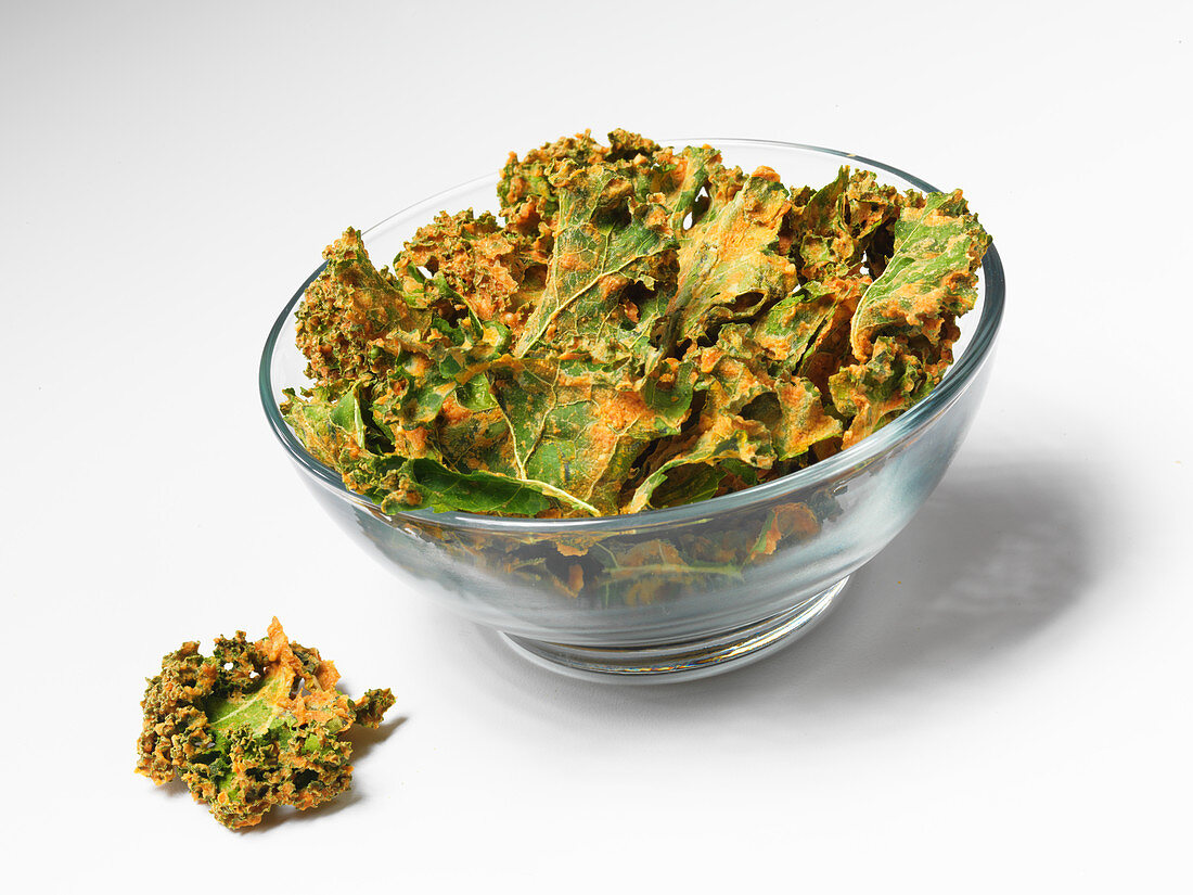 Kale chips in a glass bowl