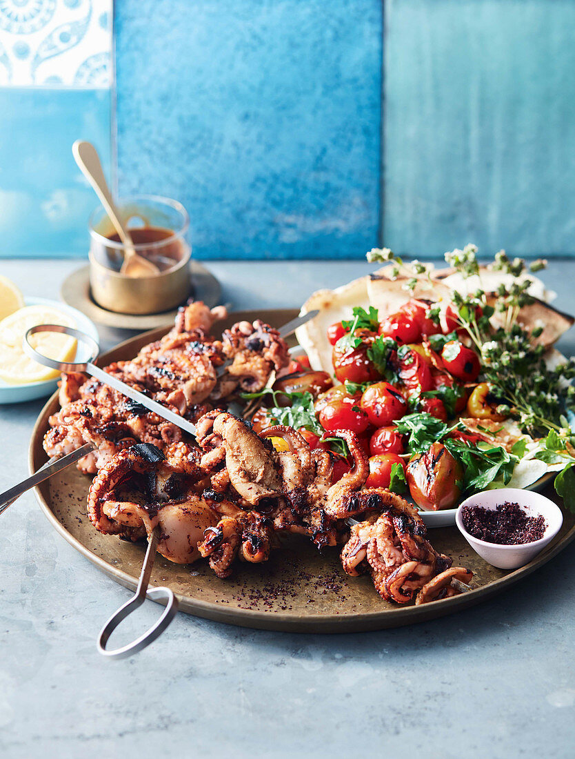 Glazed octopus skewers with chunky fattoush