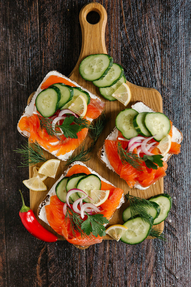 Salmon rolls with cream cheese, cucumber and dill