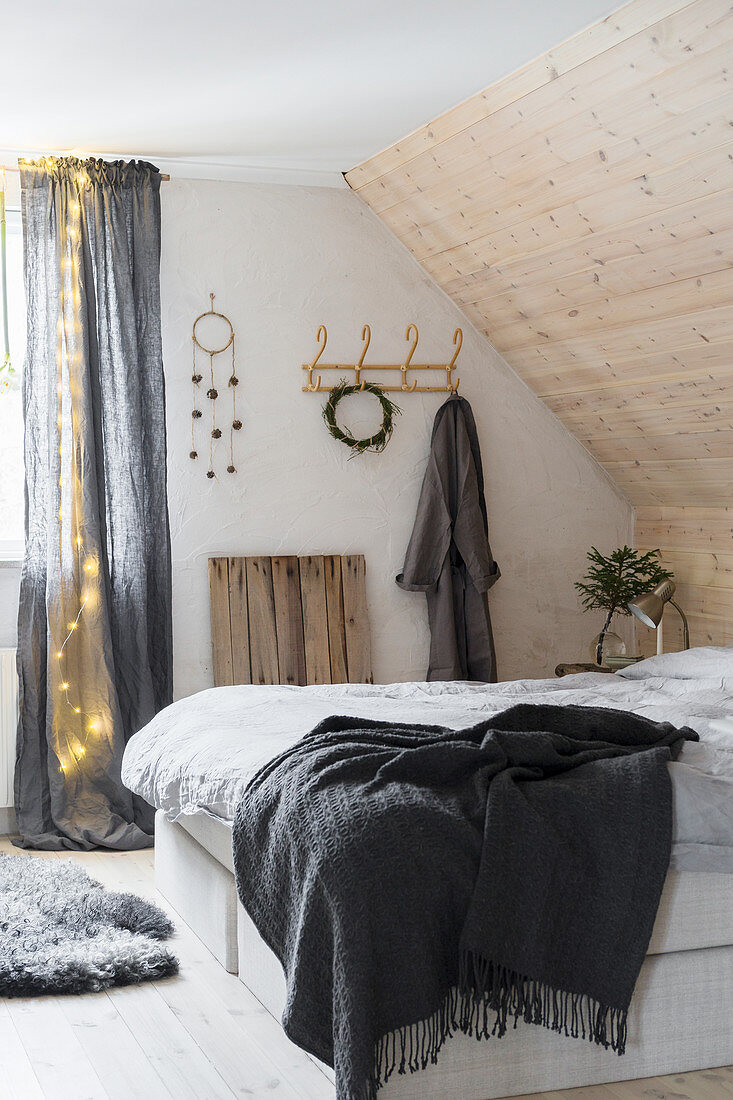 Rustic bedroom with sloping ceiling