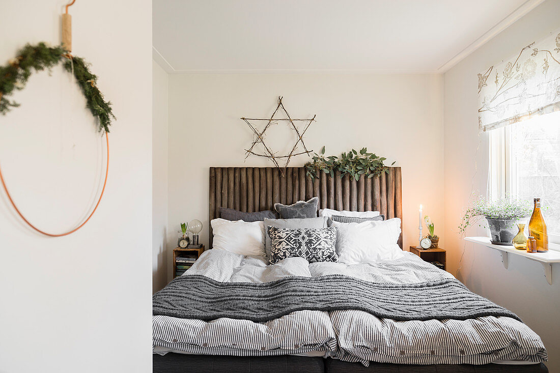 Bedroom decorated for winter in natural shades