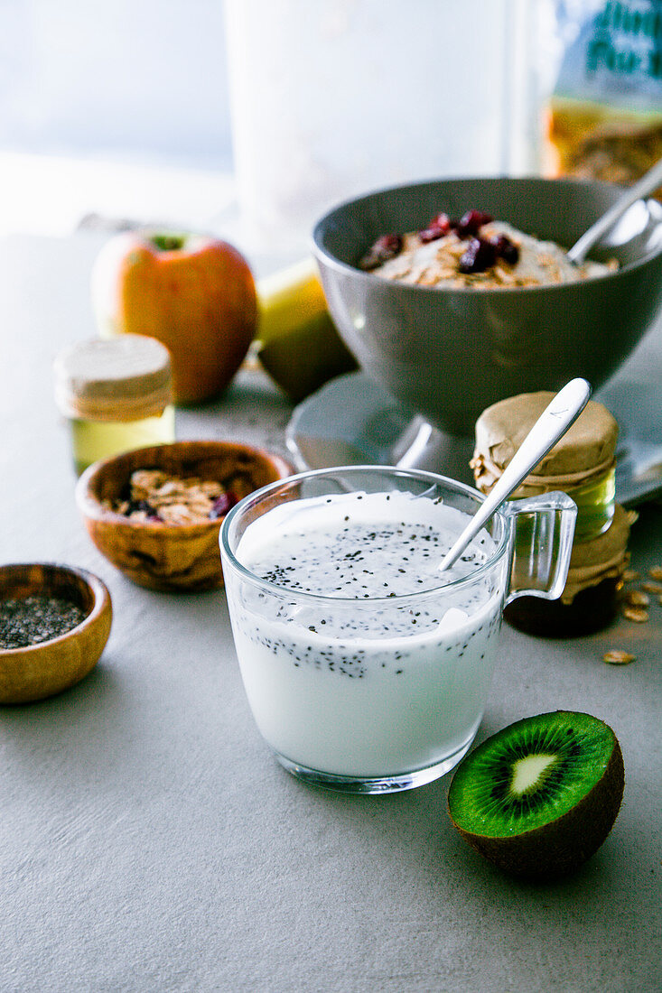 Healthy breakfast variety: Cereals with fruit and Yogurt with seeds