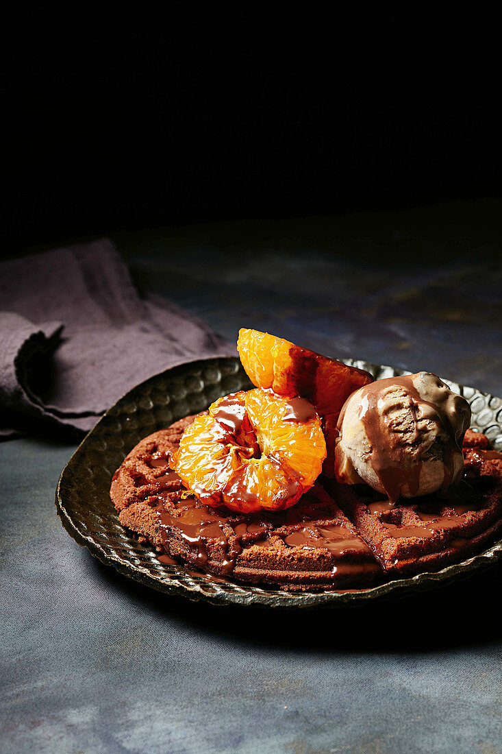 Brownie waffles with caramelized mandarins and chocolate ice cream