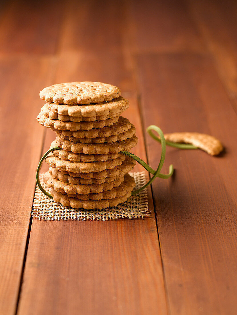 A stack of biscuits on a wooden table