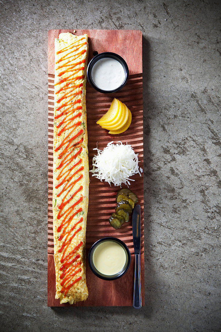 An egg roll with various side dishes (Korea)