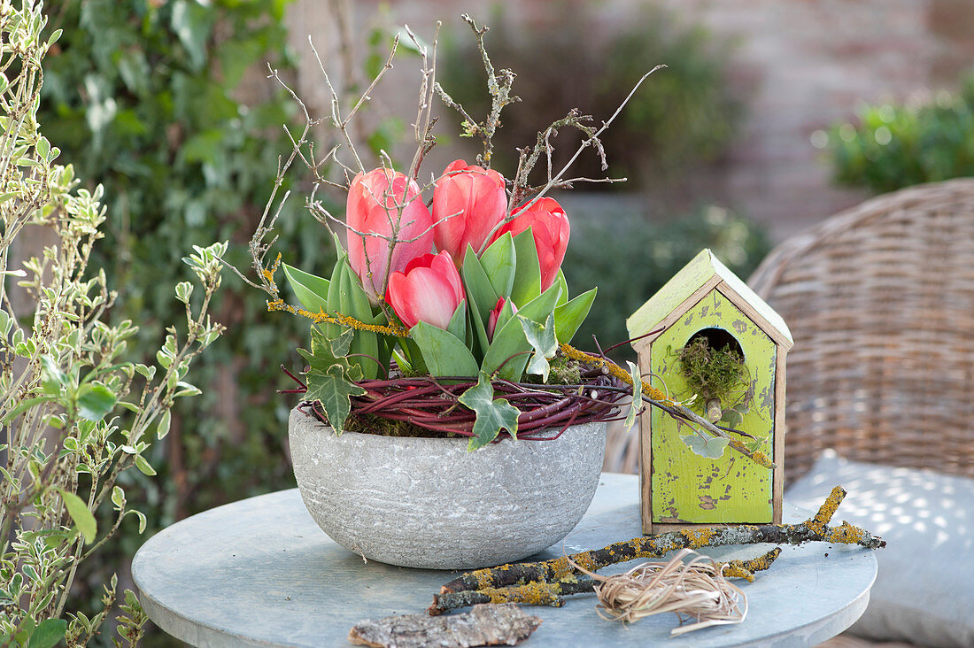 Red Tulips In A Gray Shell