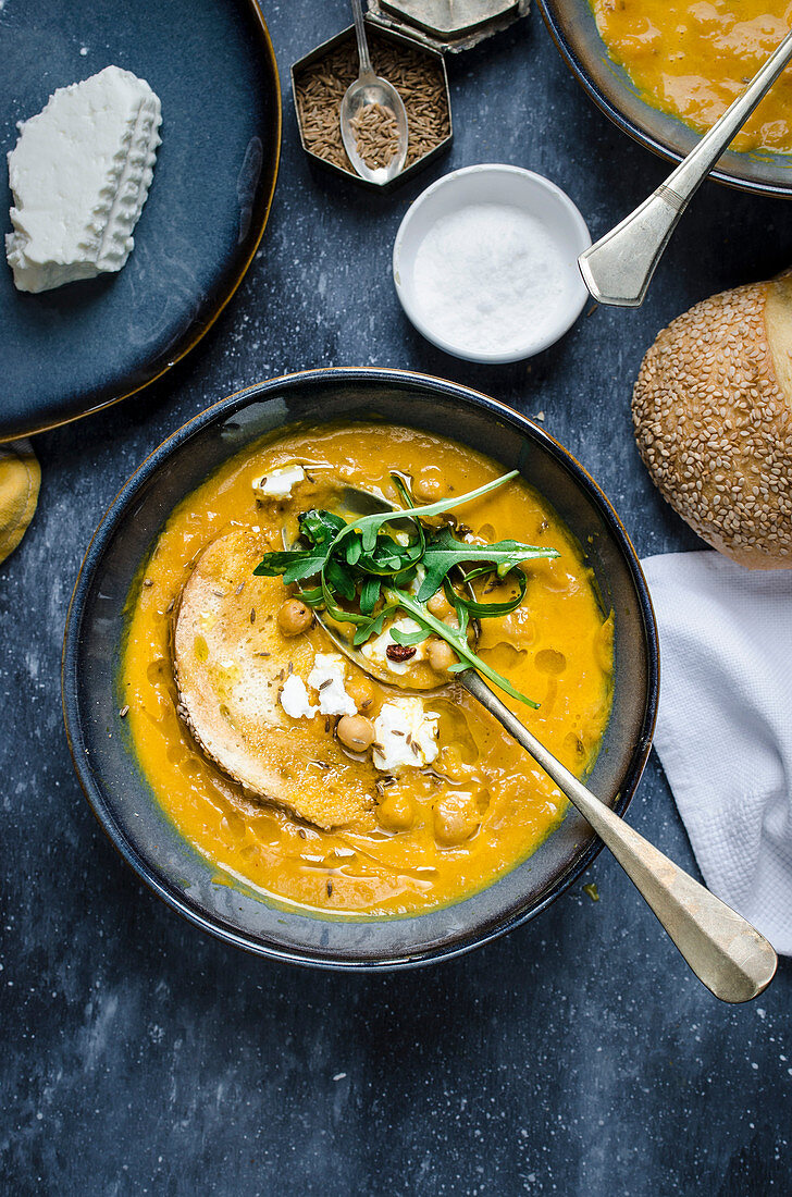 Carrot and pumpkin soup with crispy chikpeas and ricotta