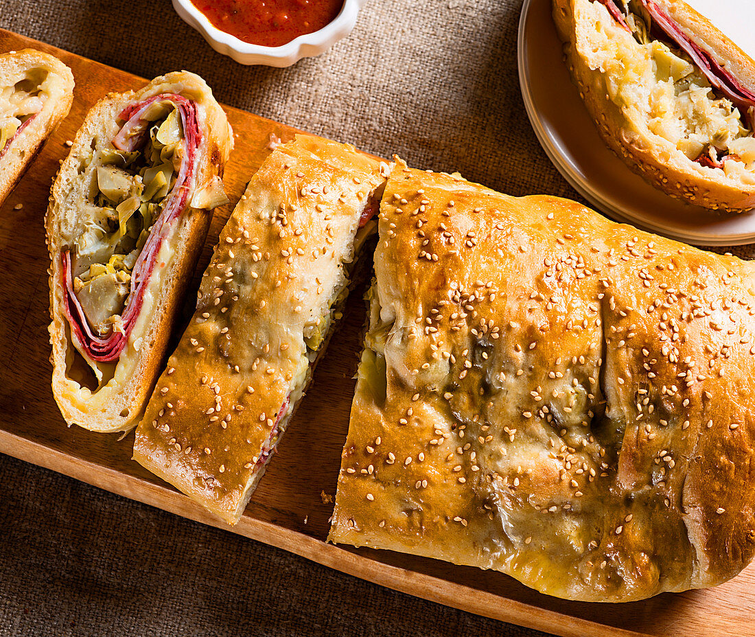 Stromboli stuffed with sausage and vegetables (top view)