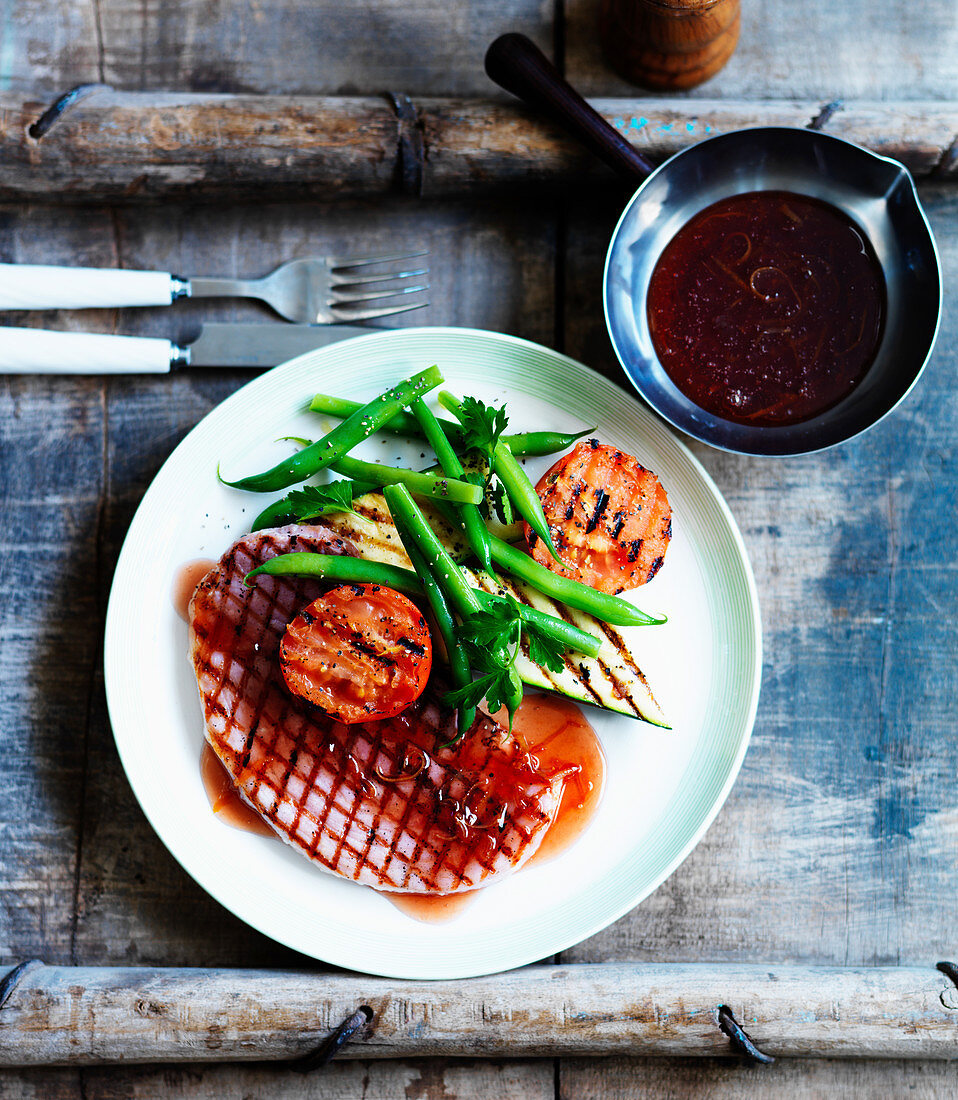 Ham with beans, grilled tomatoes and Cumberland sauce