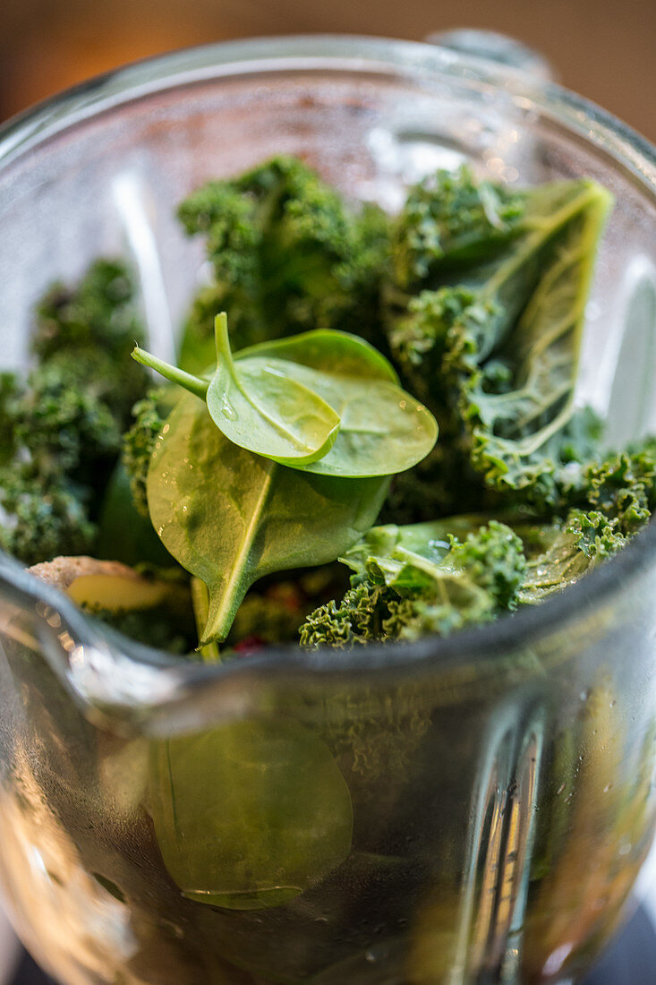 Green vegetables in a blender