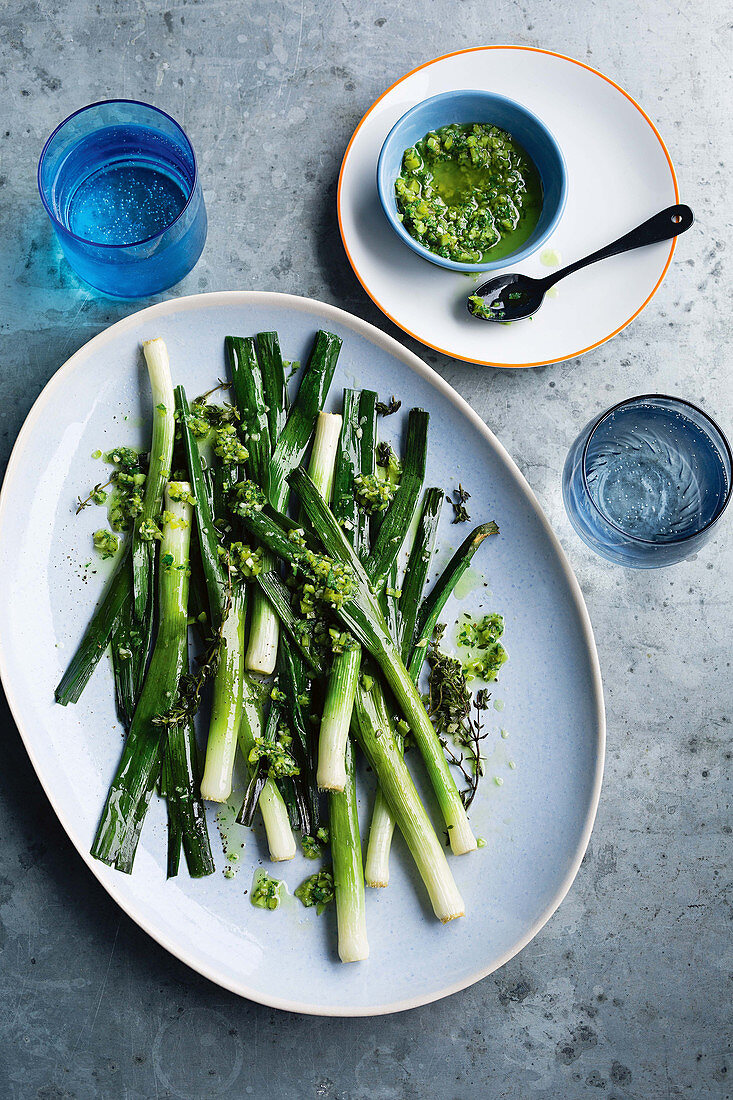 Baked baby leeks with oregano salsa