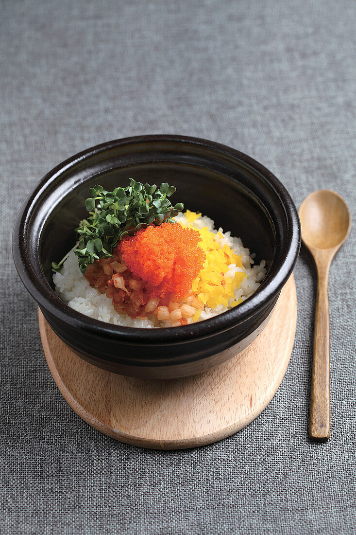 Korean rice with roe in a stone pot
