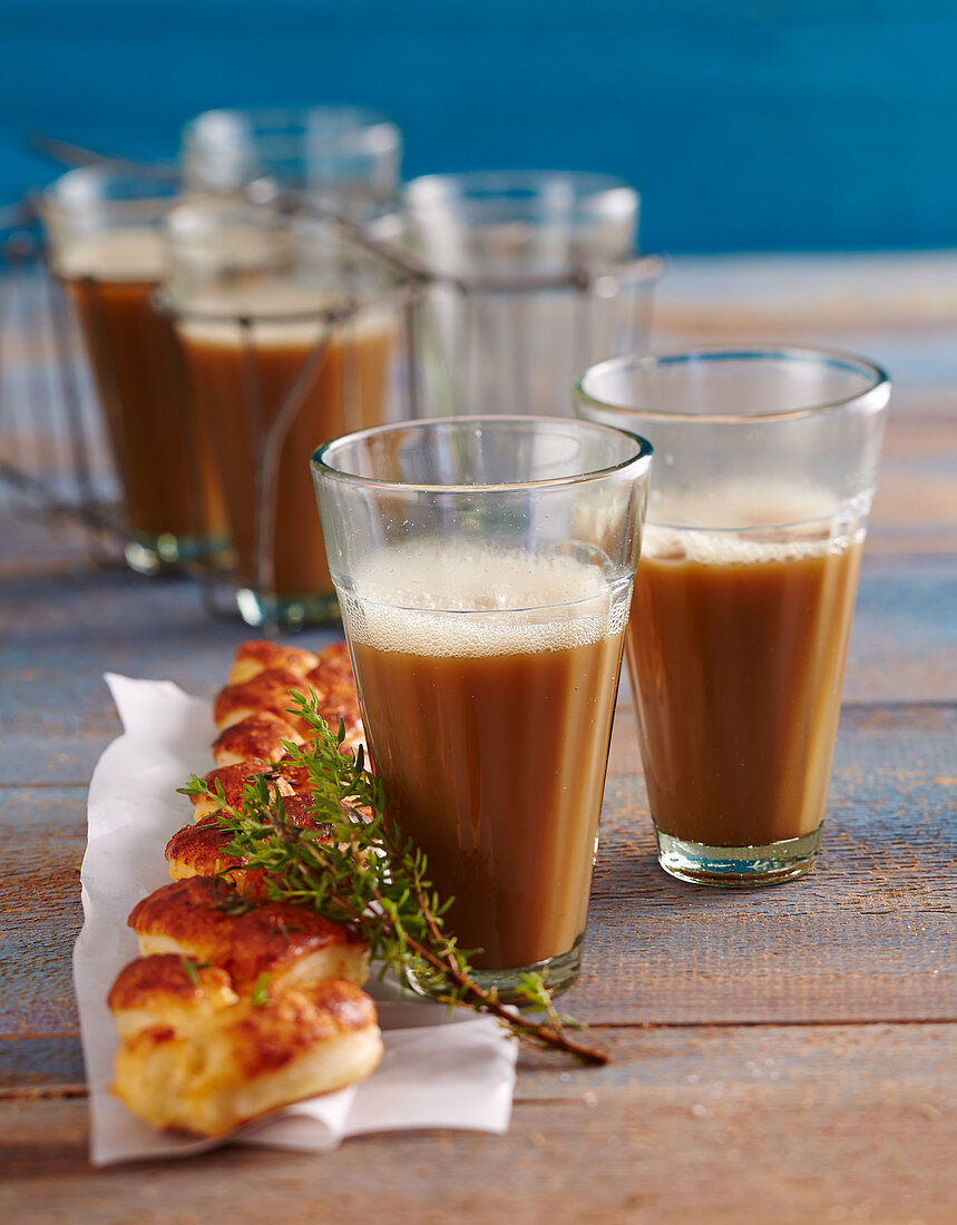 Hot drinks with a puff pastry plait and thyme