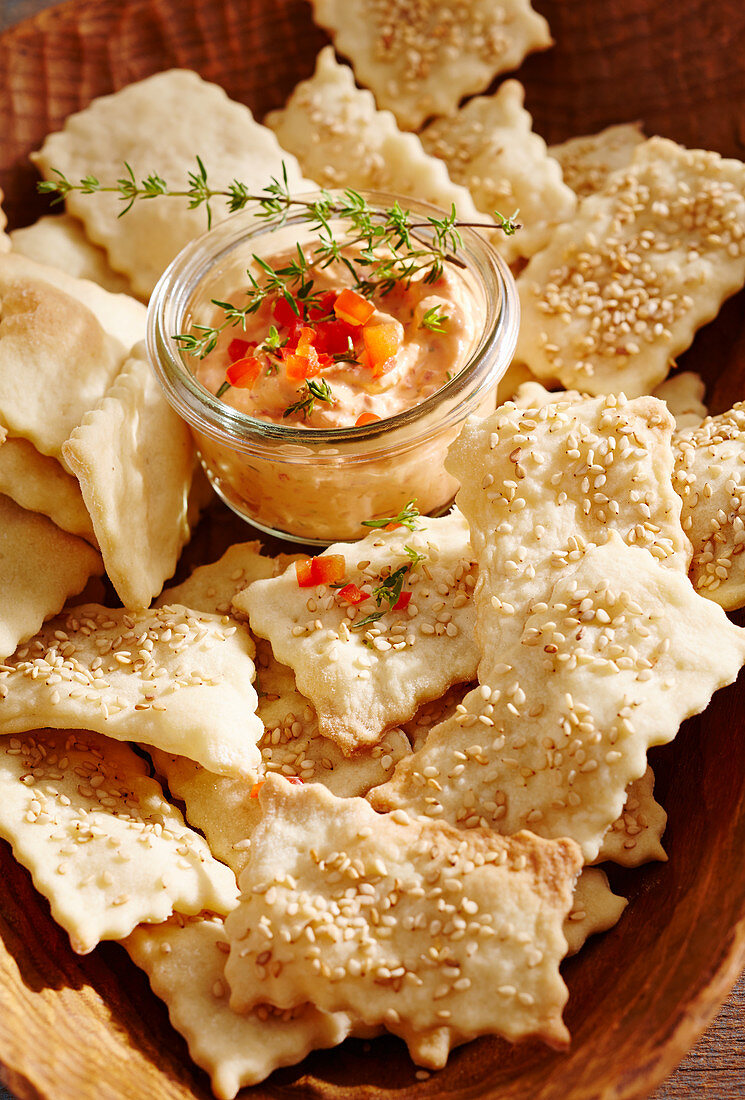 A pepper dip and crackers