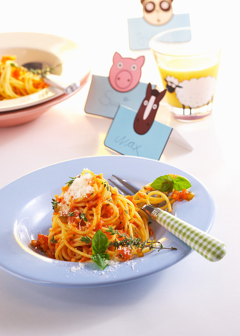 Spaghetti with vegetarian carrot bolognese sauce and herbs