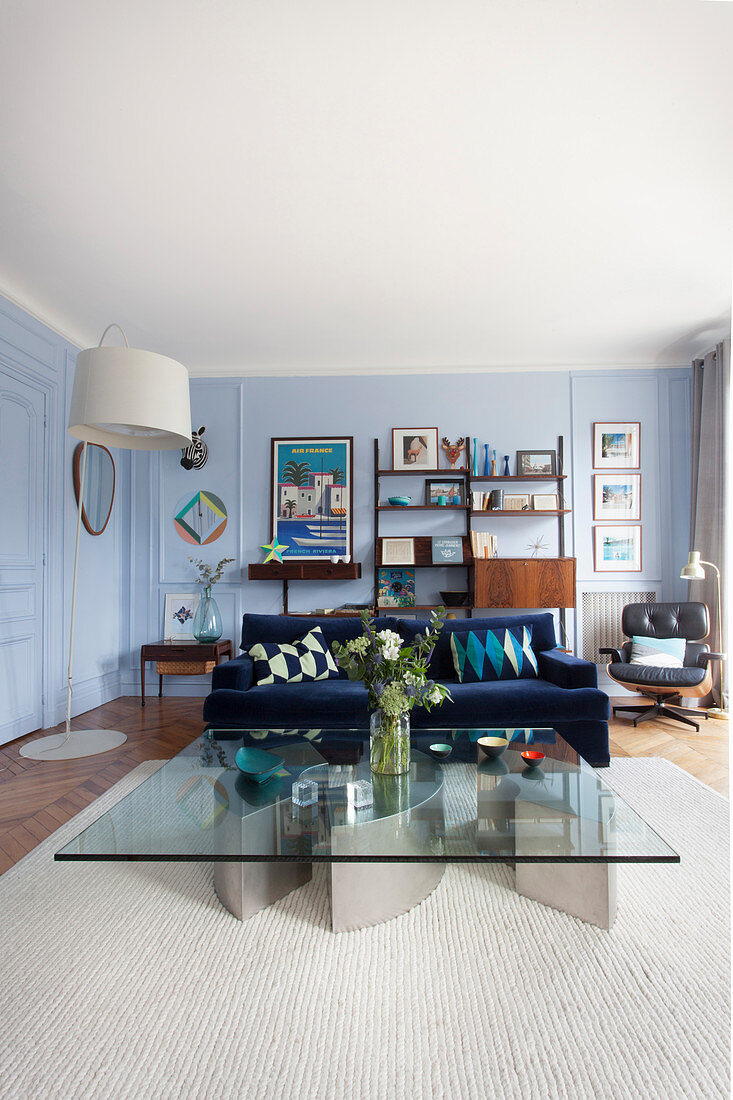 Vintage designer furniture in living room of Parisian period building