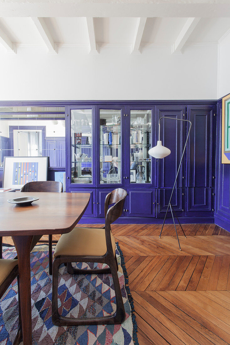 Vintage designer furniture in dining room of Parisian period building