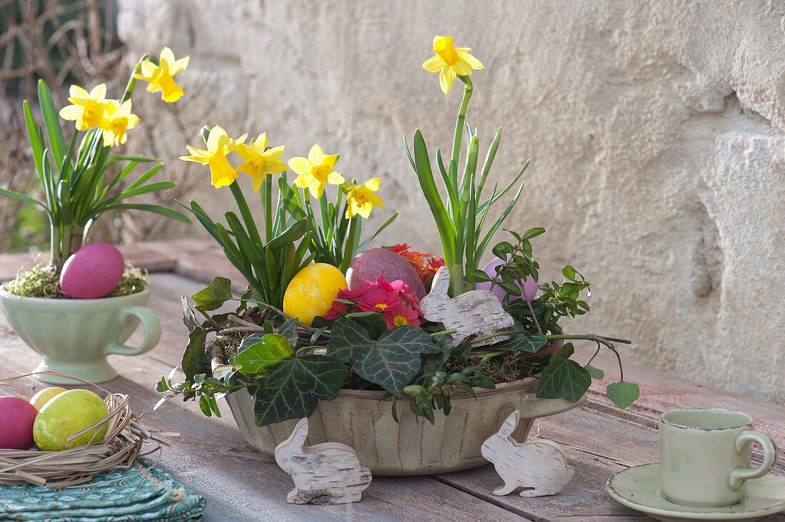 Easter Cup With Daffodils And Primroses