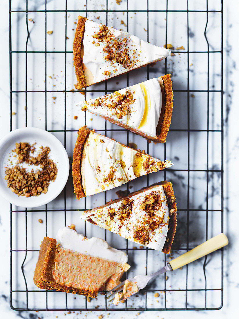 No-bake carrot cake topped with cream and chopped walnuts