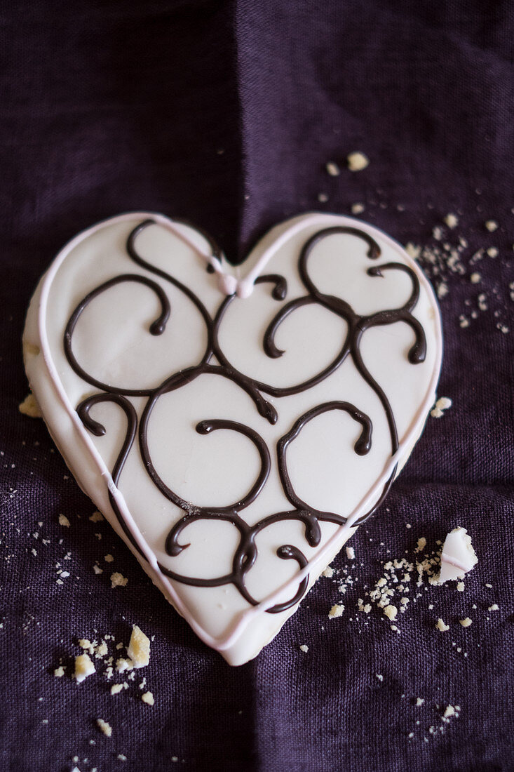 A heart-shaped biscuit with icing