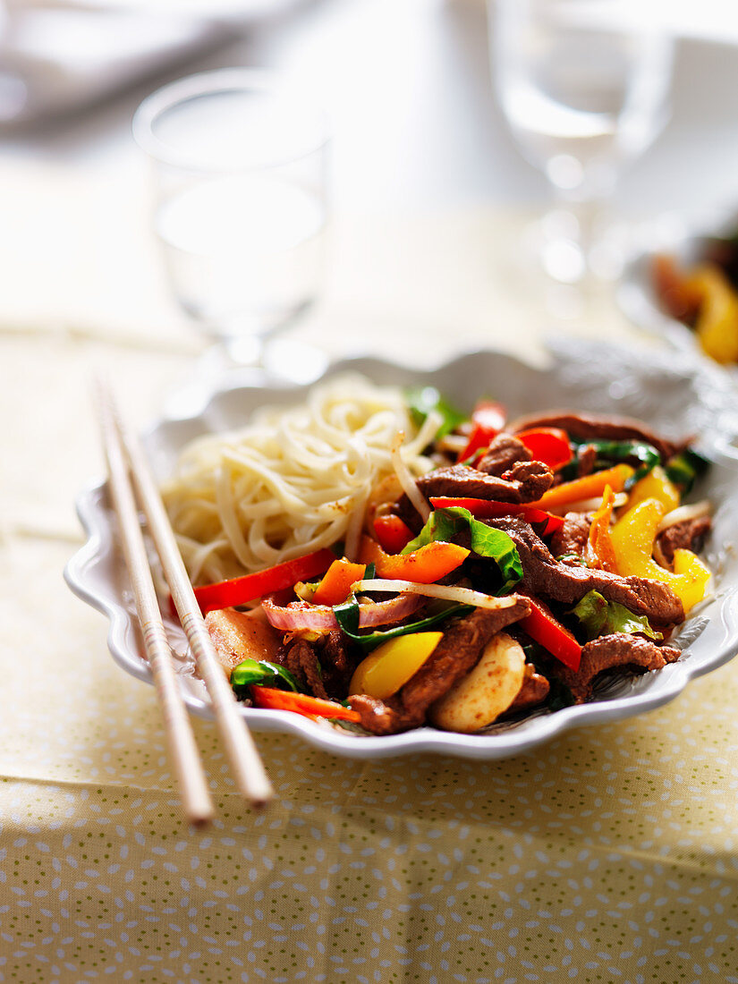 Pork with peppers and noodles (China)