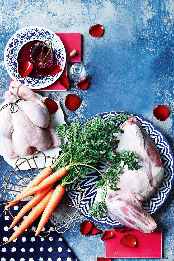 Carrots, lamb shoulder, chicken and rose blossoms