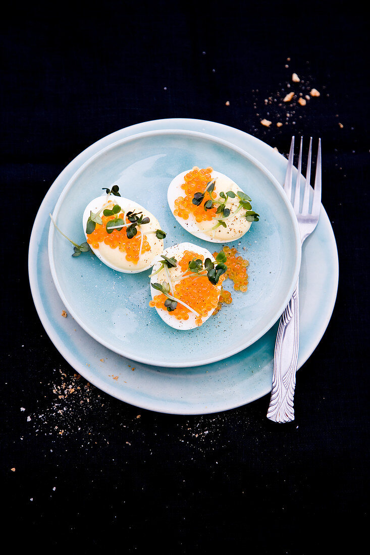 Russian deviled eggs with caviar