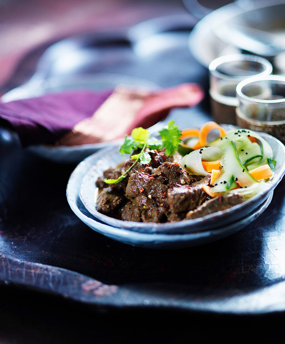 Beef Madras with carrots, cucumbers and coriander leaves (India)