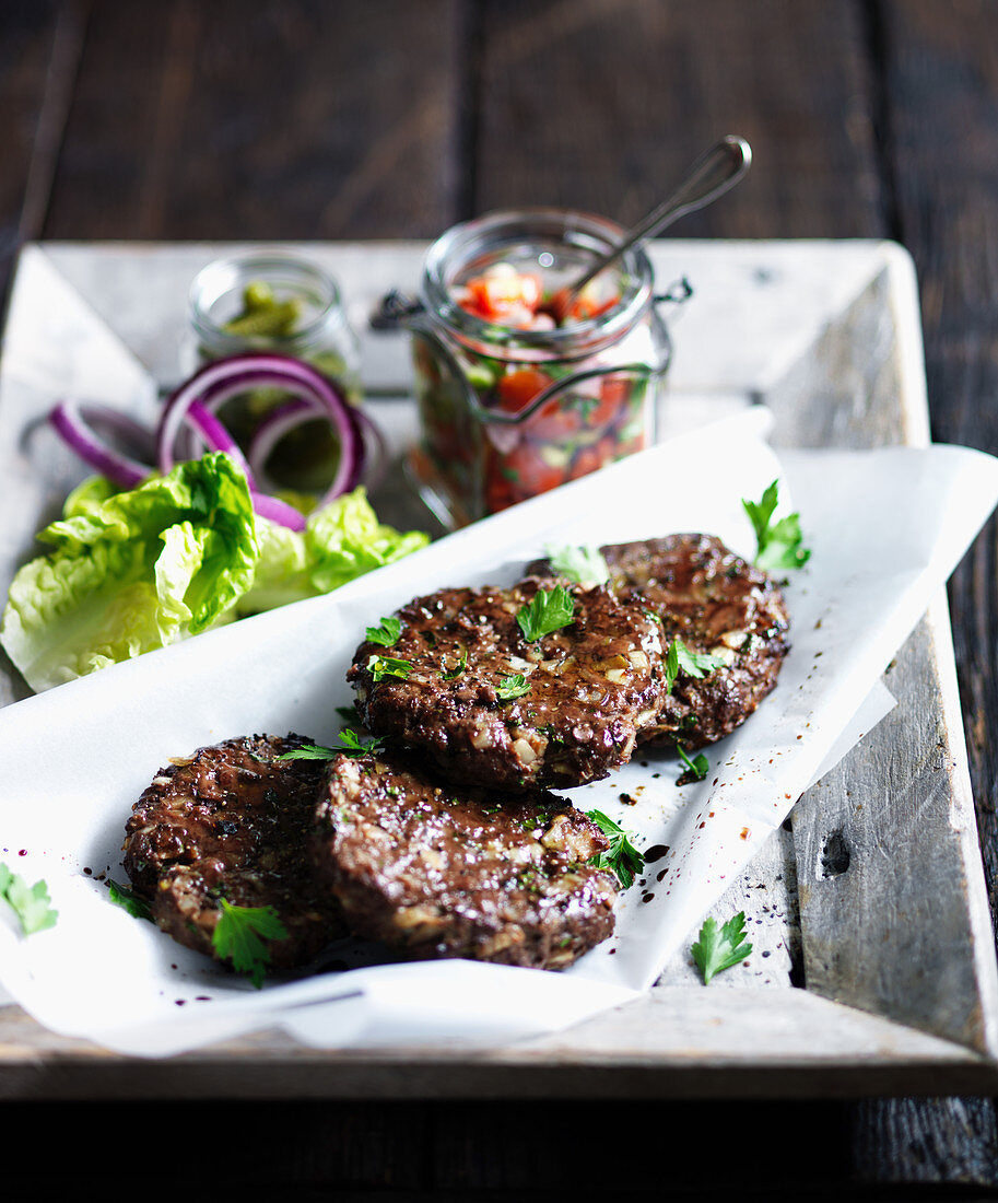Beef burgers with gherkins and salsa