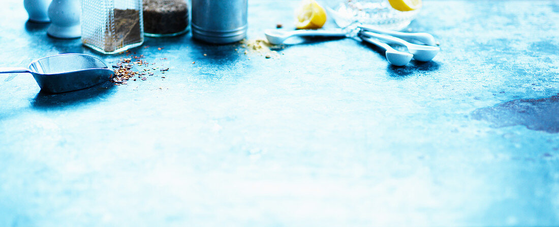 Various spices and lemons on a tabletop